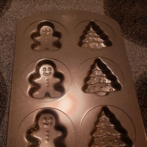 2 new Christmas muffin/cookie pans.  Excellent condition. Never used.